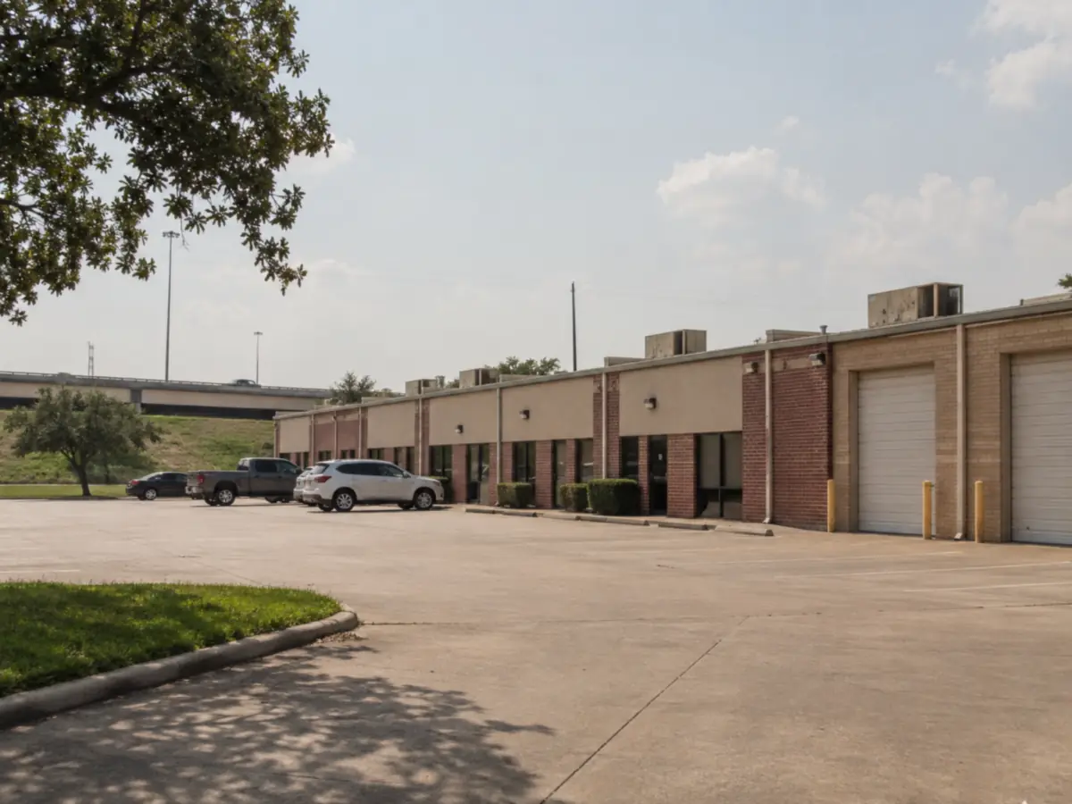 Single-storey brick office and flex units with rooftop packaged air conditioning equipment
